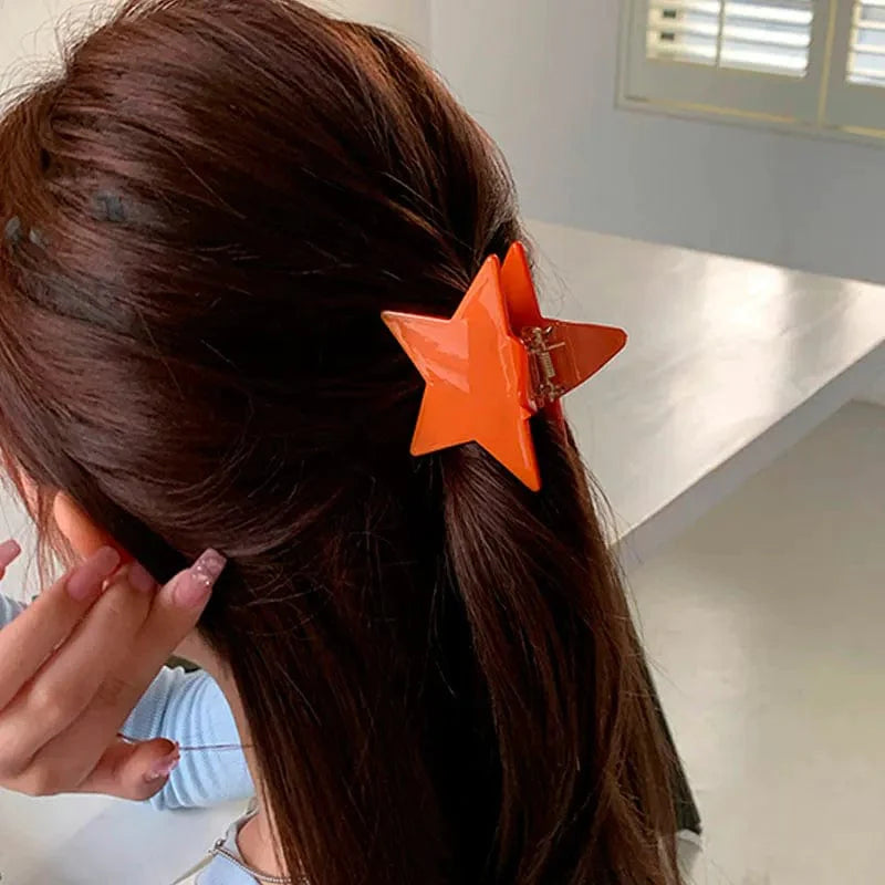 A Orange Pentagram Hair Claw